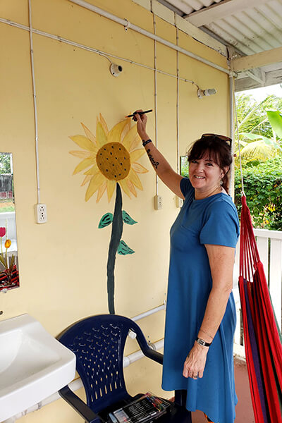 painting sunflowers on the house